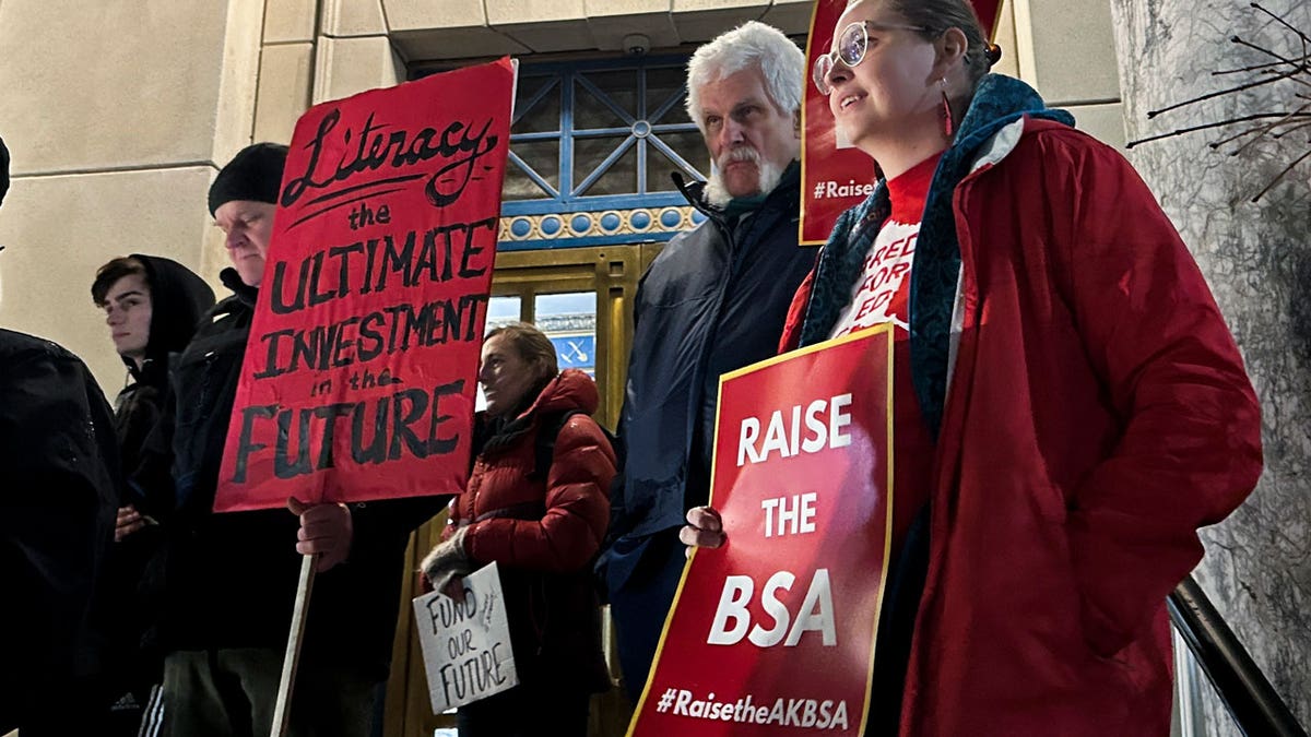 People rally outside the Alaska Capitol in support of increased funding for public schools in the state.