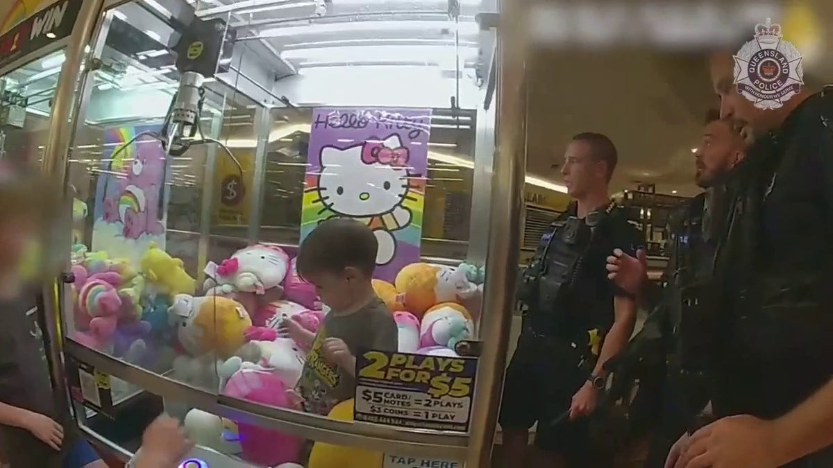 toddler stuck inside claw machine