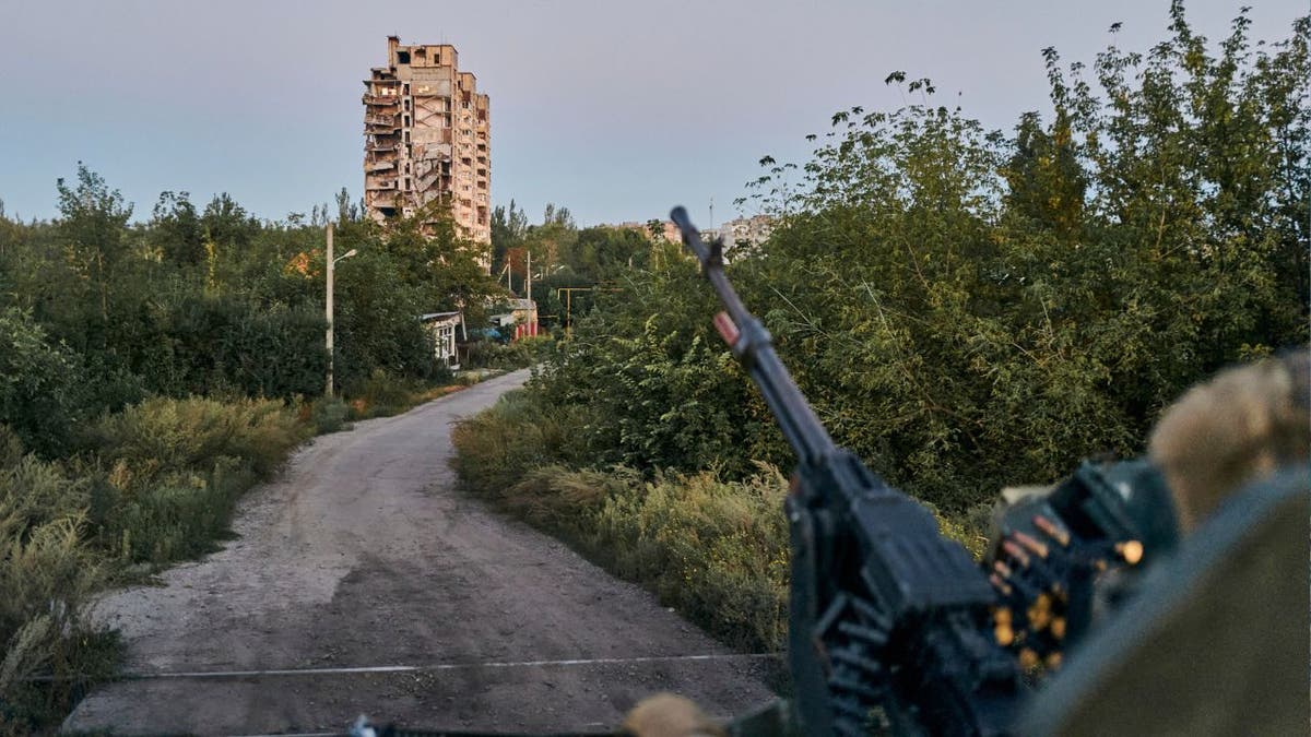 A Ukrainian soldier sits at his position in Avdiivka, Donetsk region, Ukraine, on August 18, 2023.  Officials say Ukraine's military is under pressure from a determined Russian effort to attack the strategically important eastern Ukrainian city of Avdiivka. 