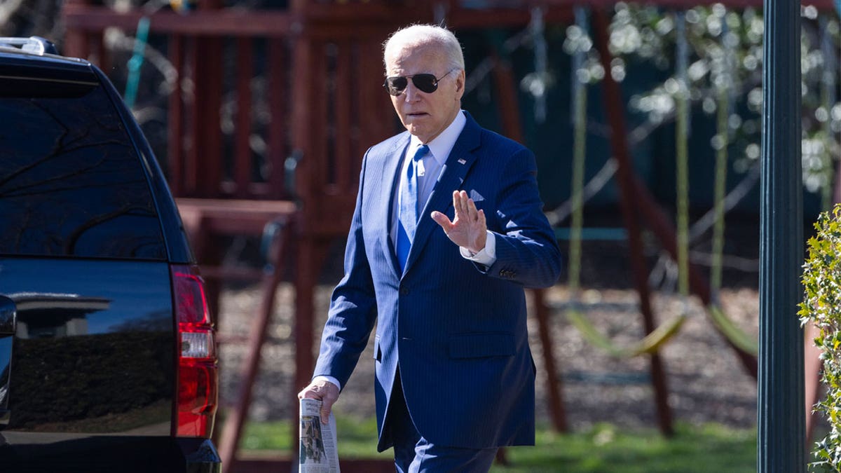 Biden with aviators walking