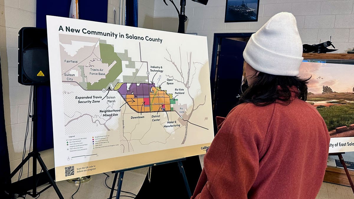 A map of a proposed city in Solano County, CA, is shown during a press conference