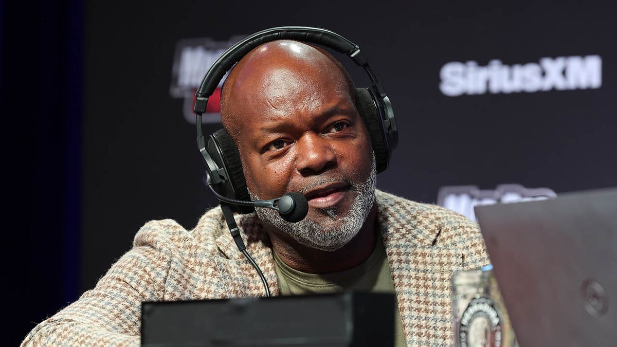 Emmitt Smith speaks during Super Bowl week