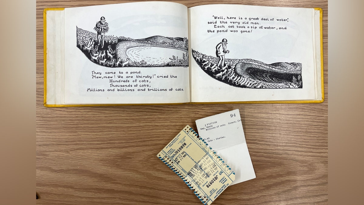 Book slip on table with children's book opened