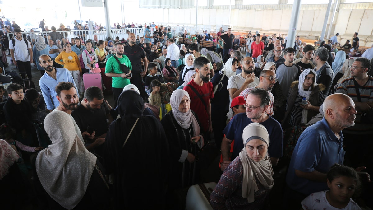 Migrants at the Gaza-Egypt border