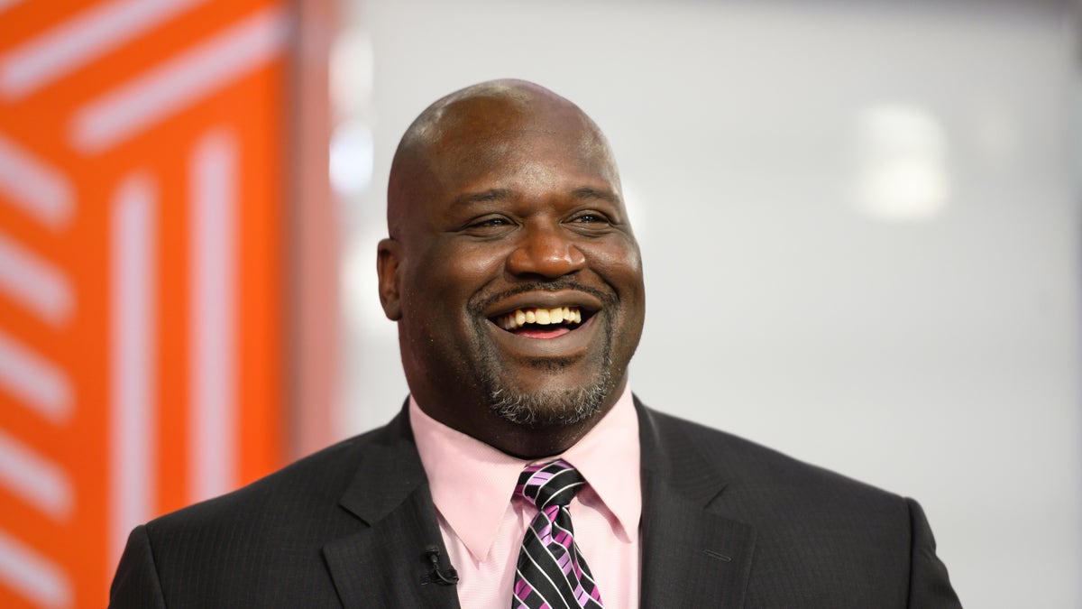 Shaquille O'Neal smiling in photo 