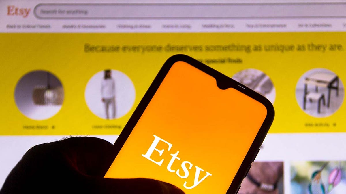 In this photo illustration, the Etsy logo is displayed on a smartphone.