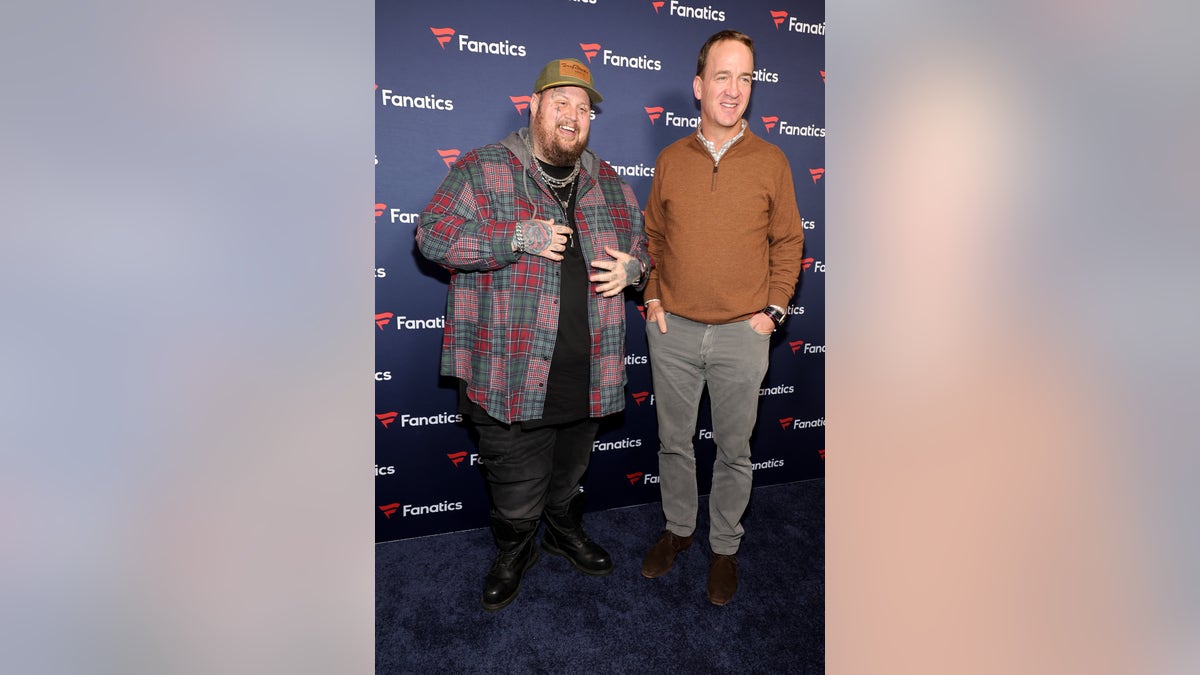 Jelly Roll and Peyton Manning on the Fanatics red carpet