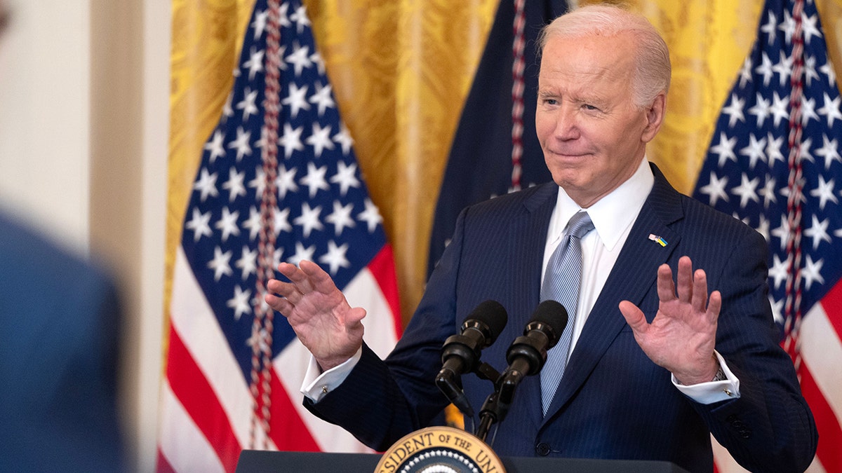 Biden with his hands up