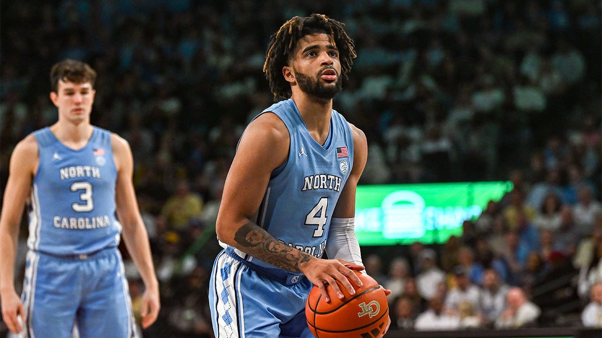 RJ Davis shoots a free throw