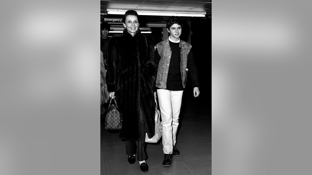 Audrey Hepburn walking with her son Luca Dotti