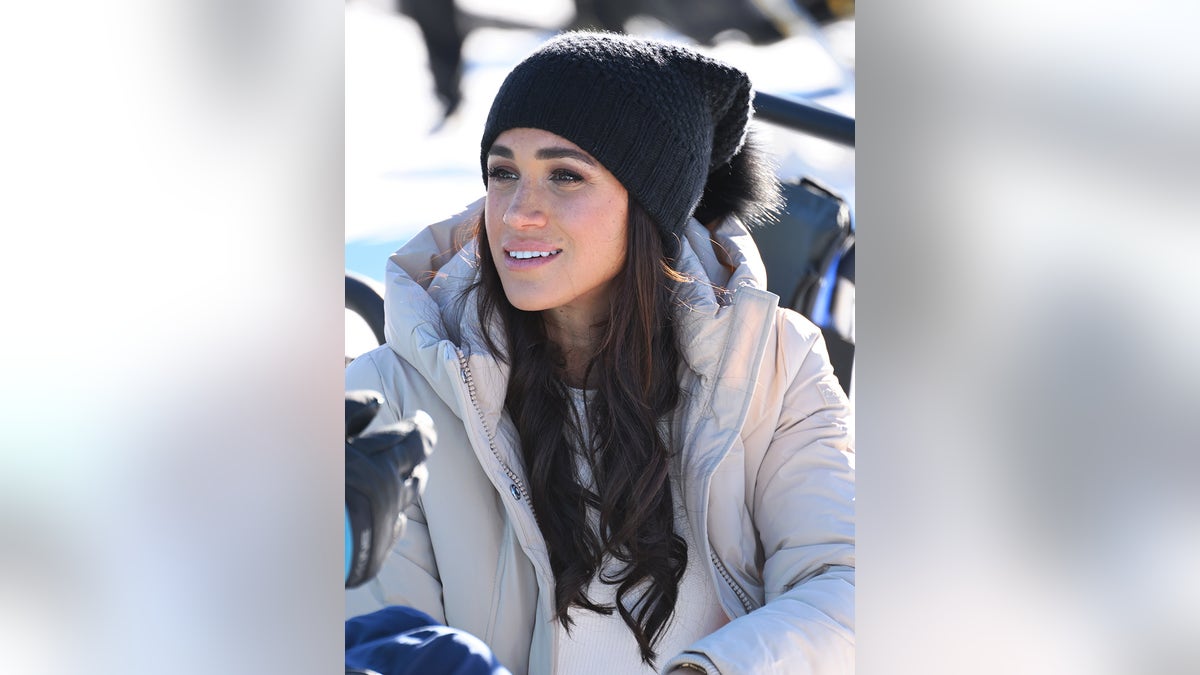 A close-up of Meghan Markle in winter clothing