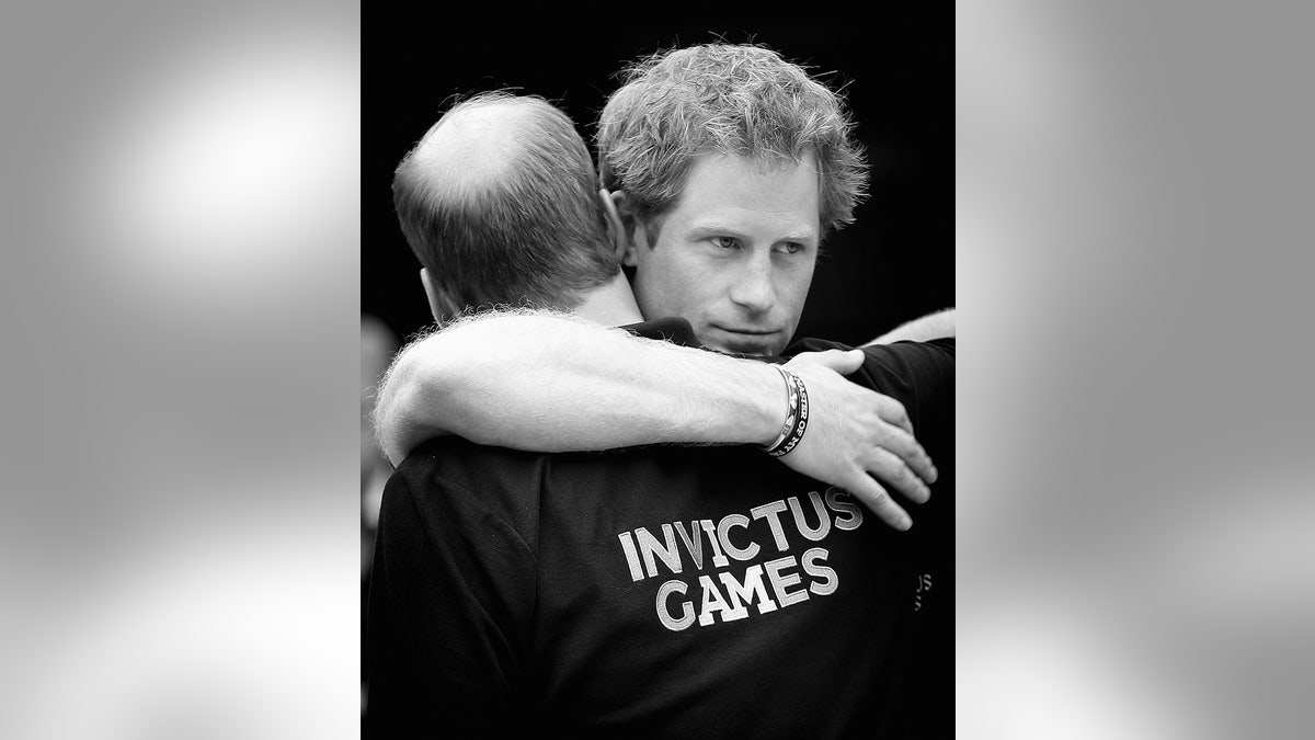 Prince Harry hugging his brother Prince William