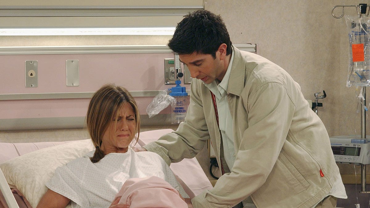 Jennifer Aniston in a scene from Friends where she gives birth