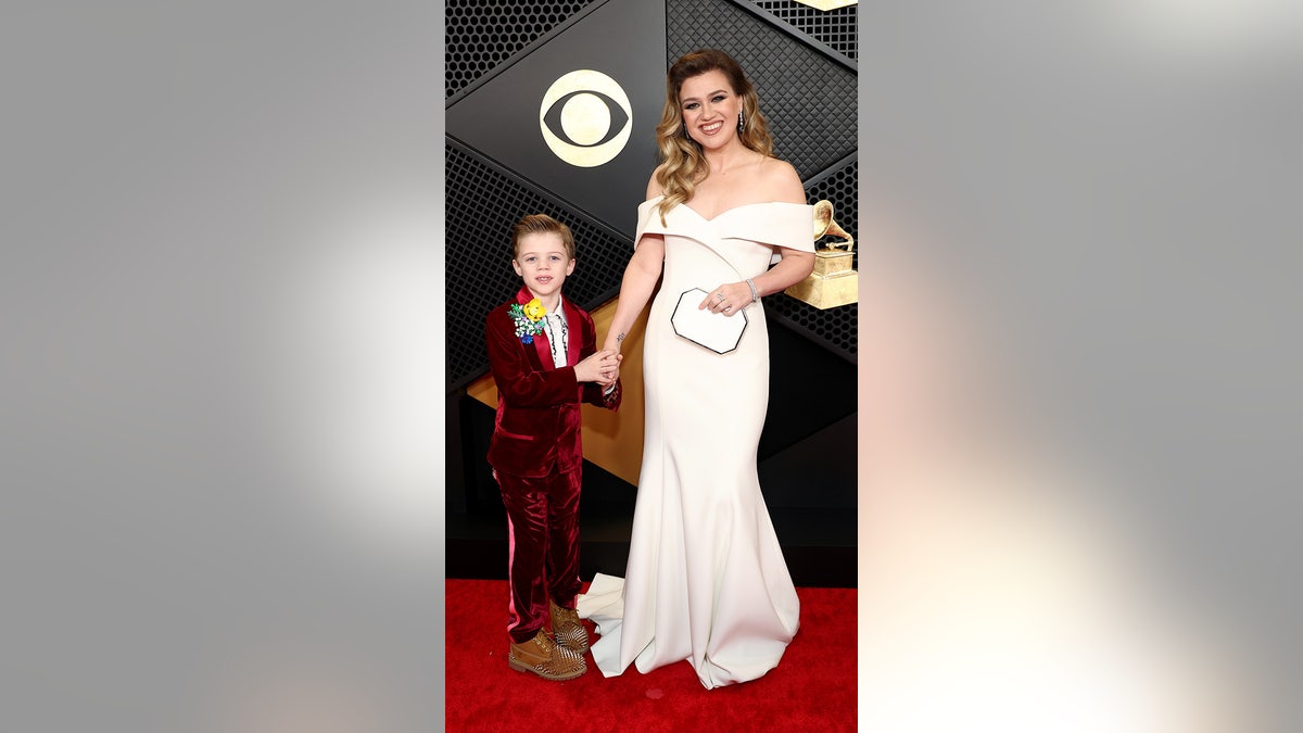 Remington Alexander and Kelly Clarkson attended the 66th Grammy Awards