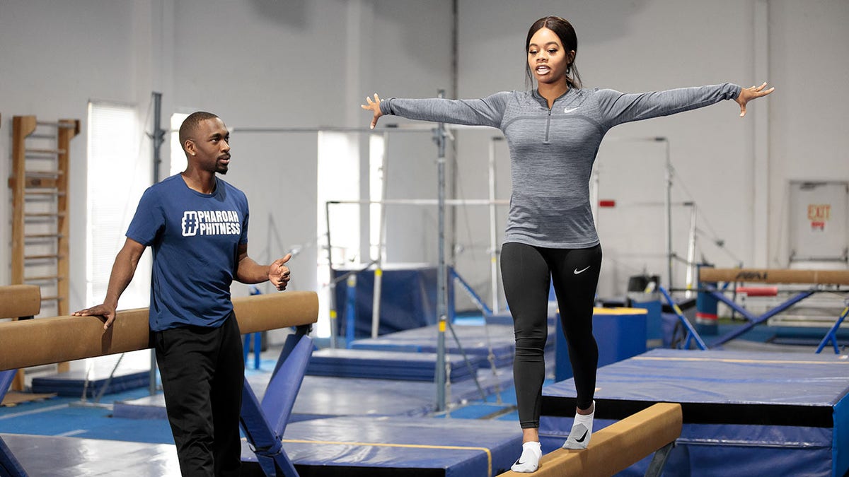 Gabby Douglas teaches gymnastics