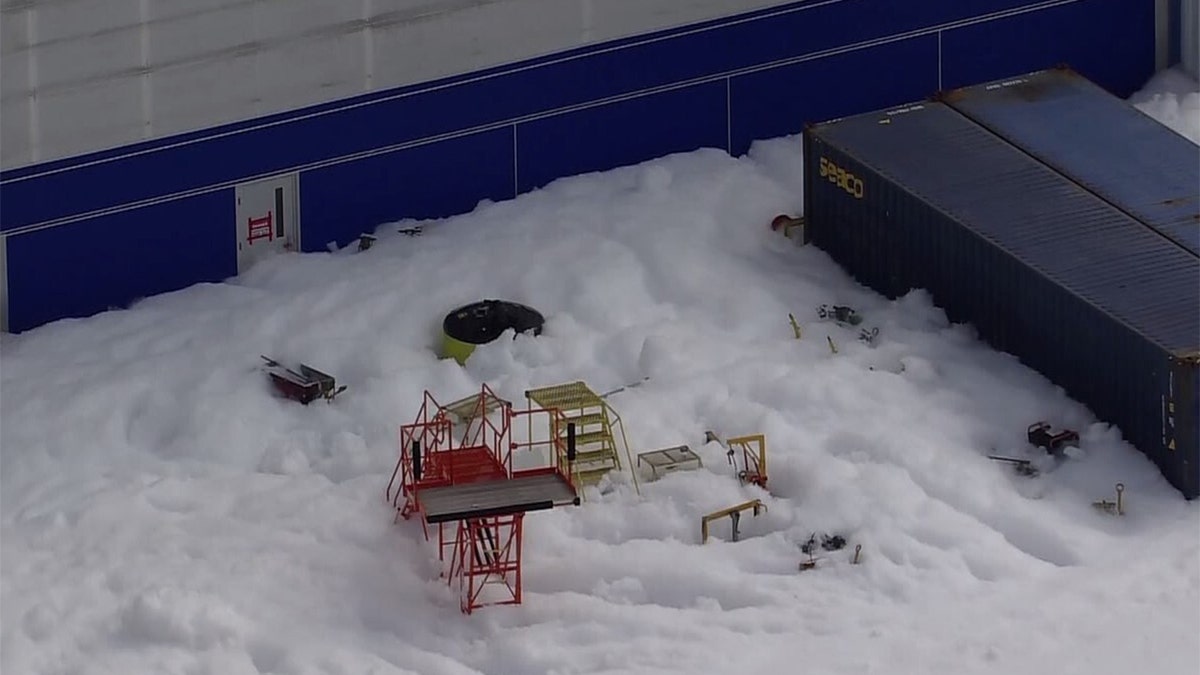 airport equipment covered in foam