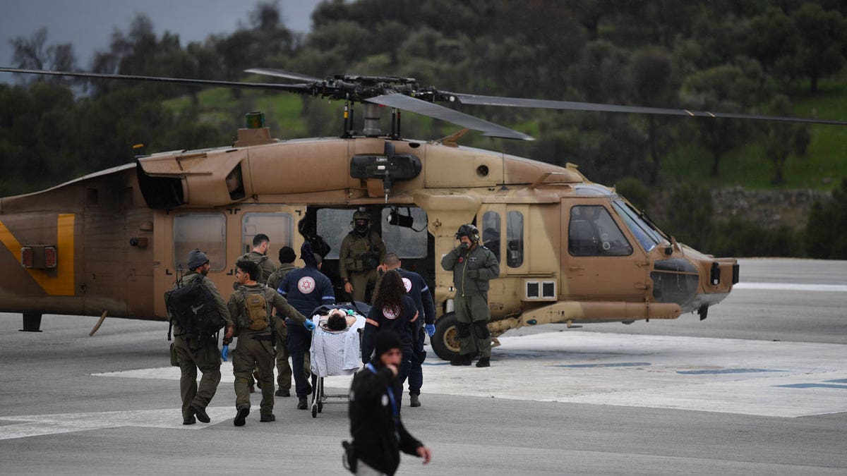 Israeli medical team evacuates an injured person