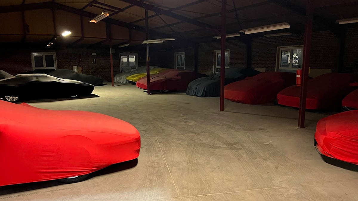 Luxury cars in warehouse