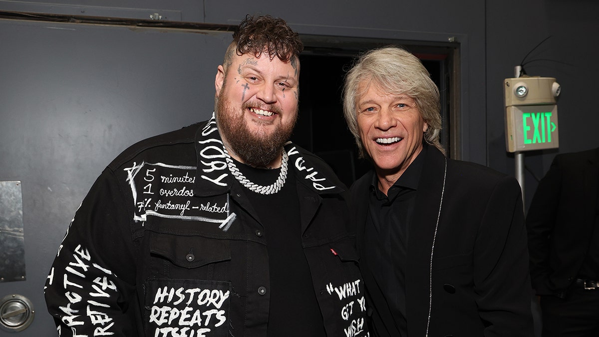 Jelly Roll and Jon Bon Jovi posing together