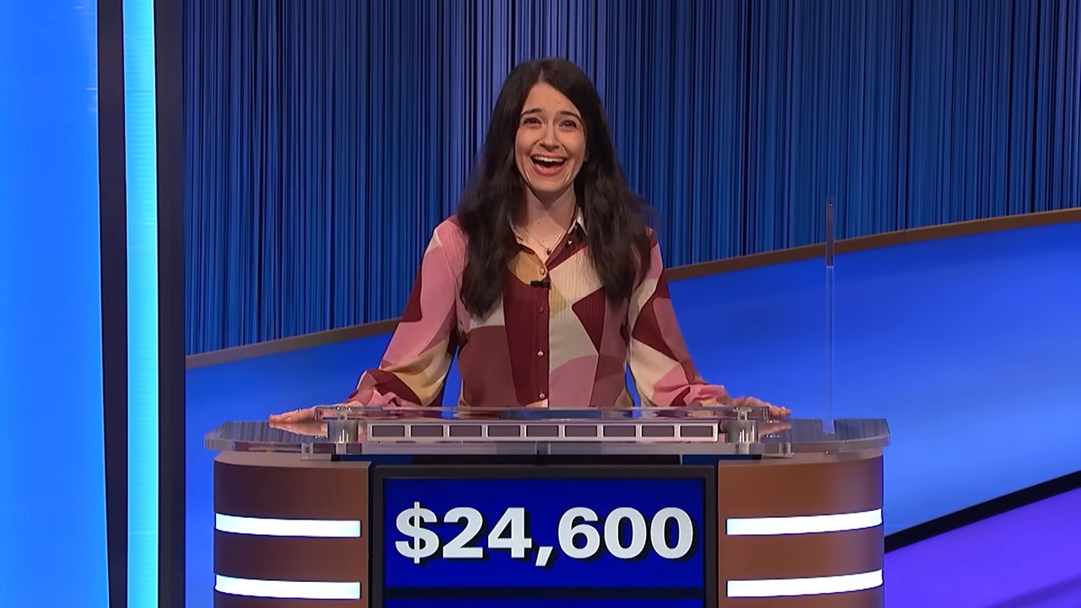 Diandra D’Alessio behind the podium on "Jeopardy!"