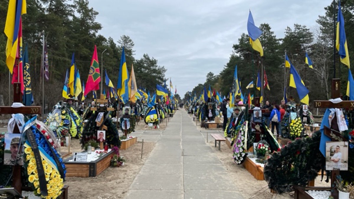 Cemetery in Kyiv with flags 