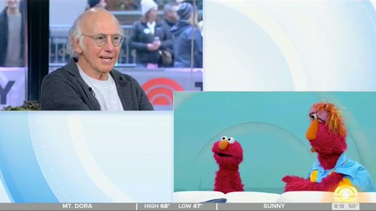 David speaking to Elmo