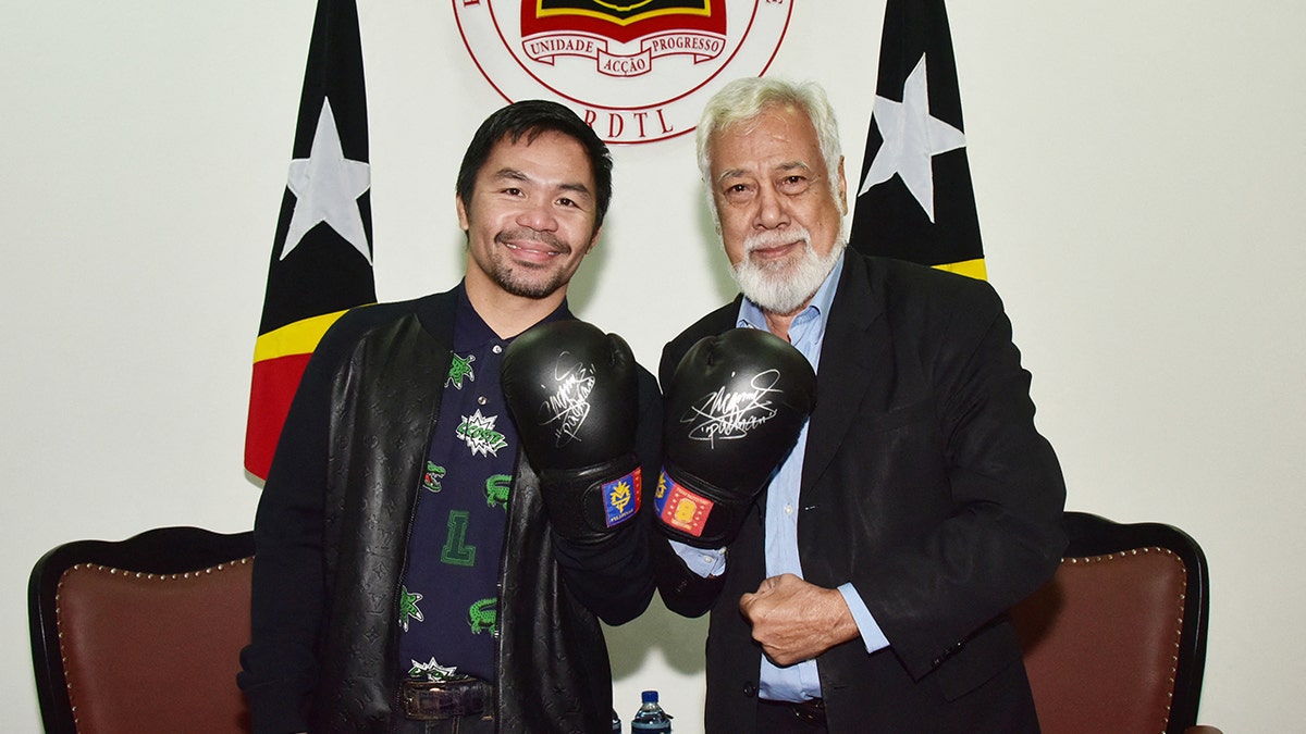 Manny Pacquio poses with East Timor Prime Minister Xanana Gusmao