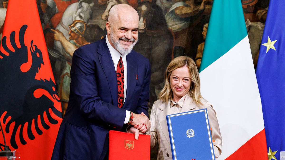 Albania's Prime Minister, Edi Rama, shakes hands with Italy's Prime Minister, Giorgia Meloni