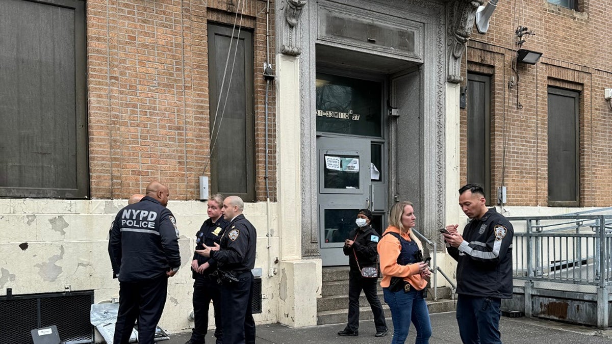 NYPD officers investigate stabbing outside migrant shelter