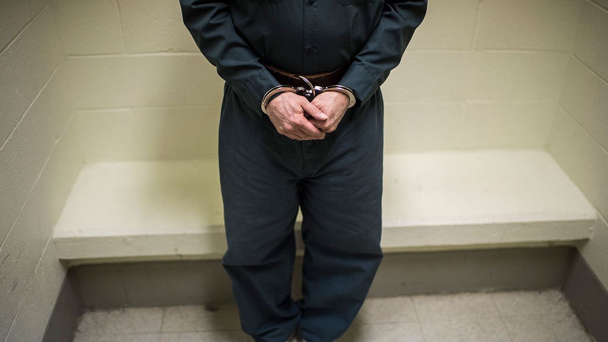 Inmate in handcuffs