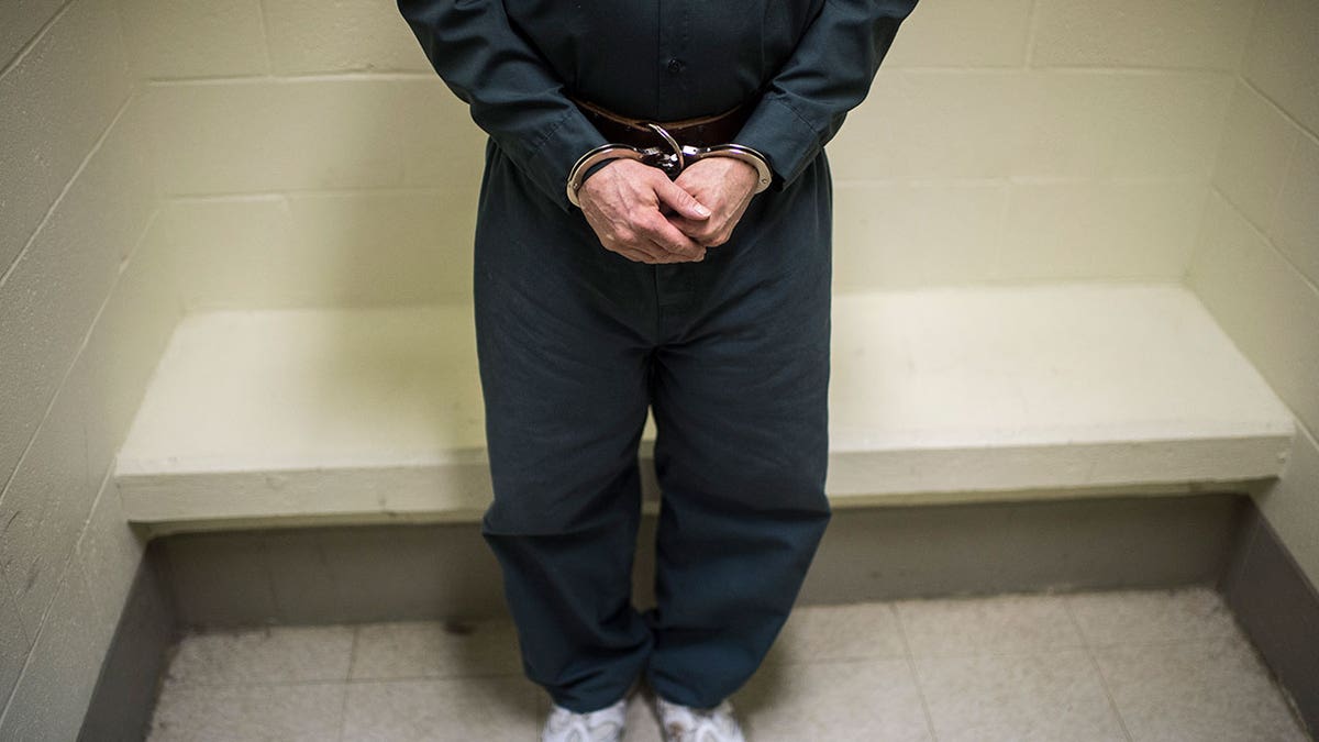 Inmate in handcuffs