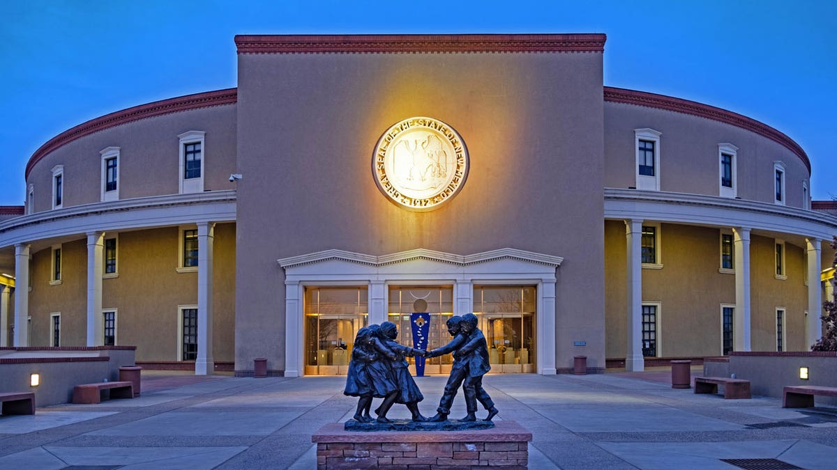 The New Mexico Capitol is seen here after sundown. A bill to reduce personal income tax passed the New Mexico House.