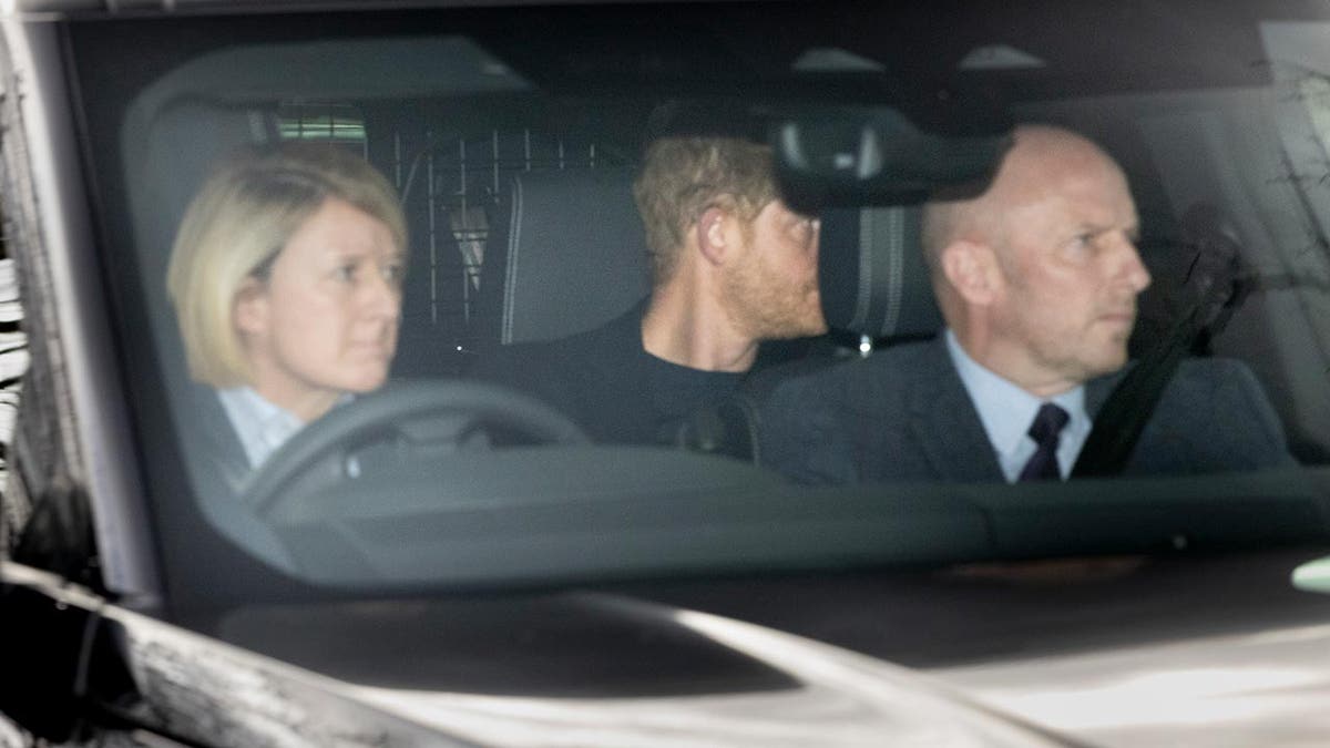 Prince Harry's side profile in a car as he arrives at Clarence House in London