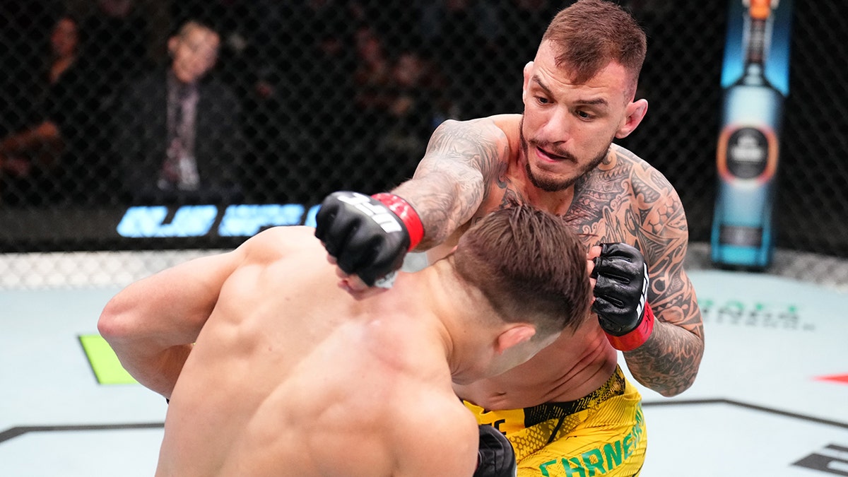 Renato Moicano punches Drew Dober