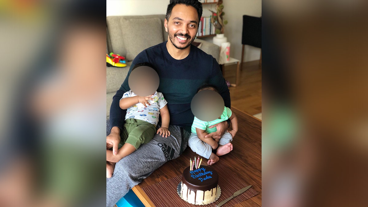 Anand Sujith Henry with his two kids.