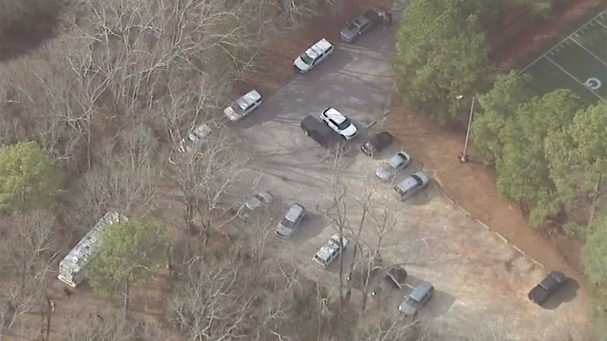 Vehicles at the scene of a UGA student death