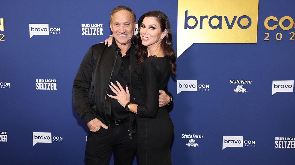 Dr. Terry Dubrow with his arm around Heather Dubrow