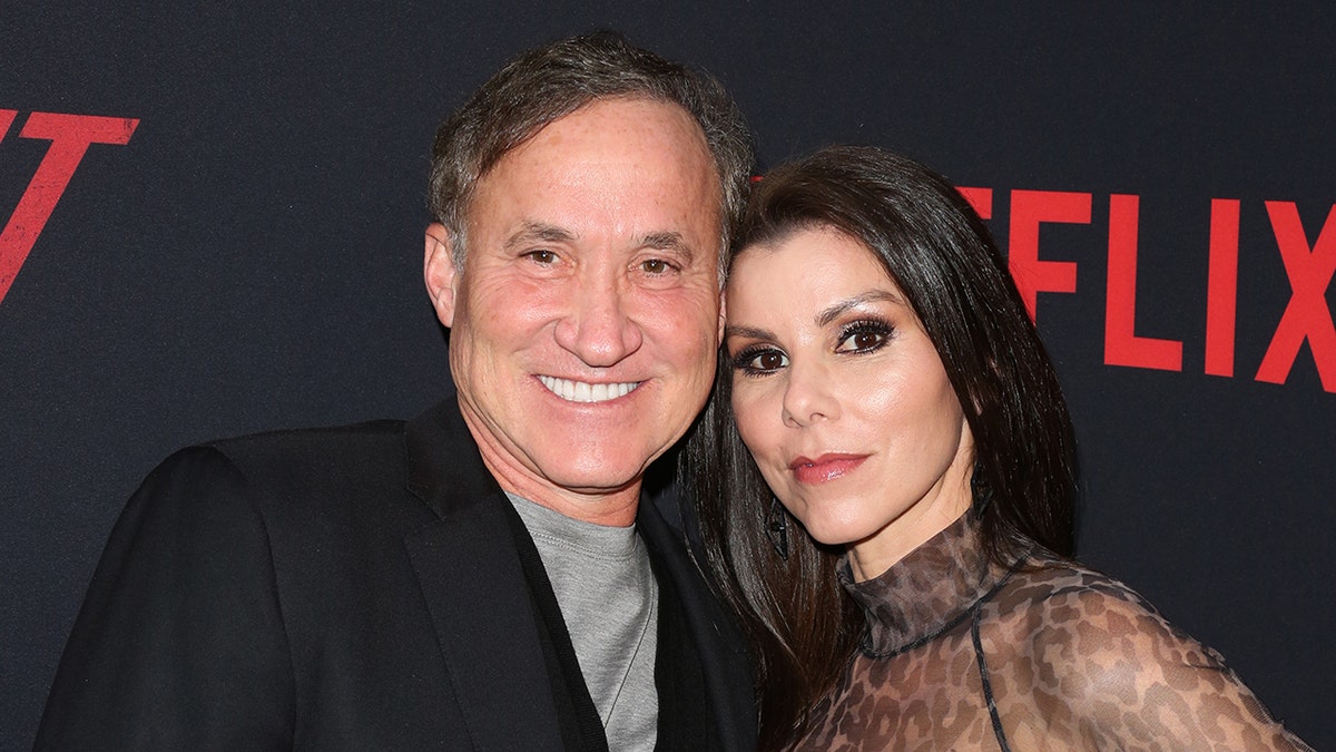 Dr. Terry Dubrow and Heather Dubrow posing together