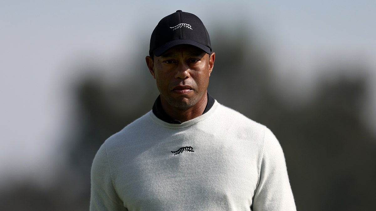 Tiger Woods walks on course