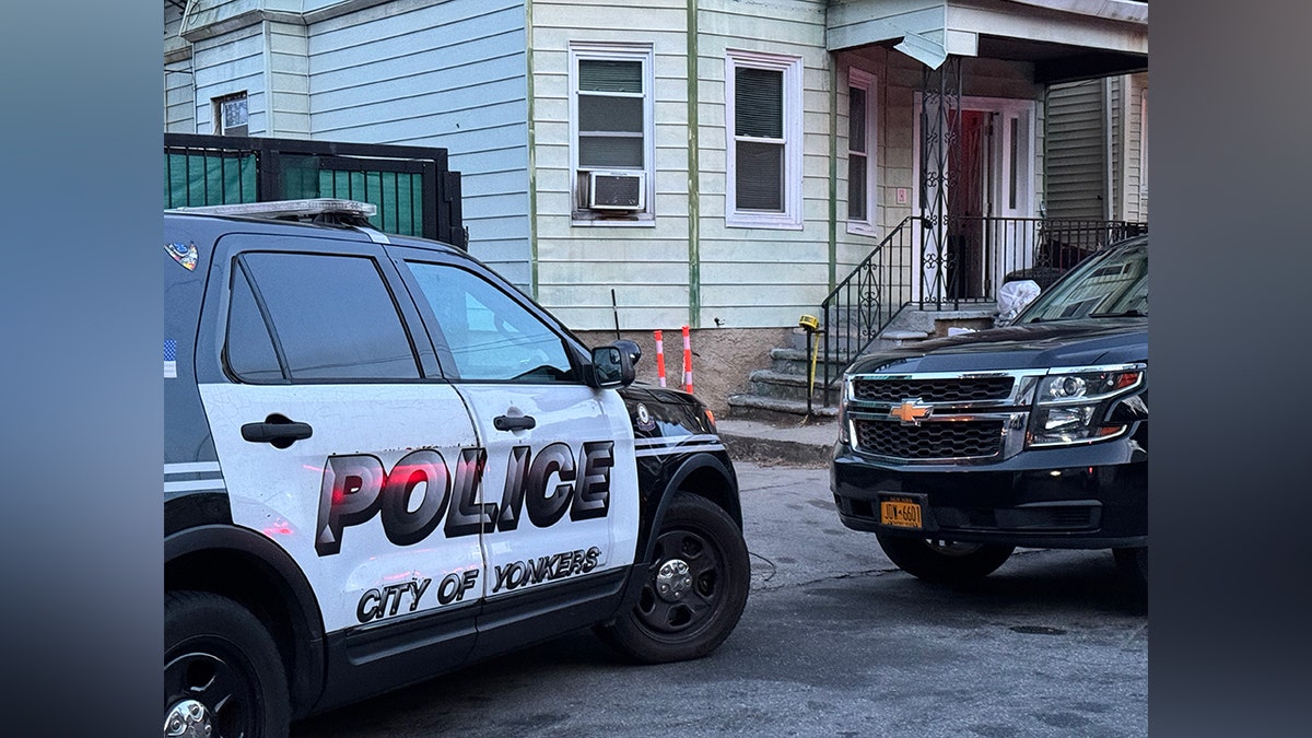 Police SUV, home in Yonkers, NY