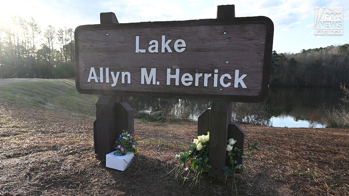 A memorial for Laken Riley is seen along Lake Herrick on the University of Georgia’s campus