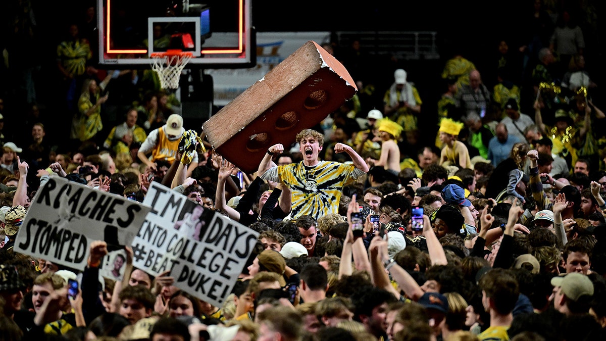 Wake Forest fans storm the court
