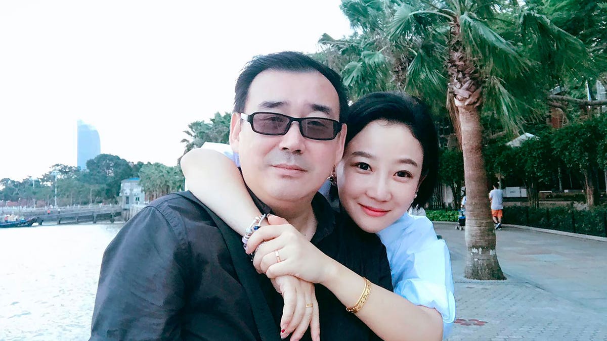 Yang Hengjun and wife
