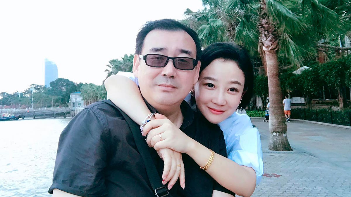 Yang Hengjun and wife