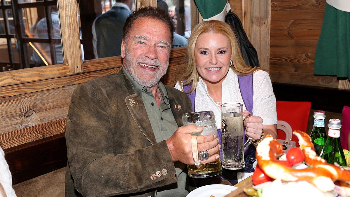 Arnold Schwarzenegger in Germany with Heather Milligan