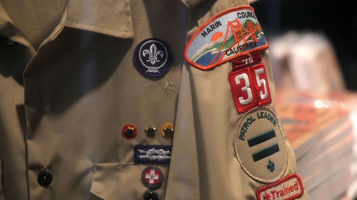 Close up shot of a Boy Scout's badges