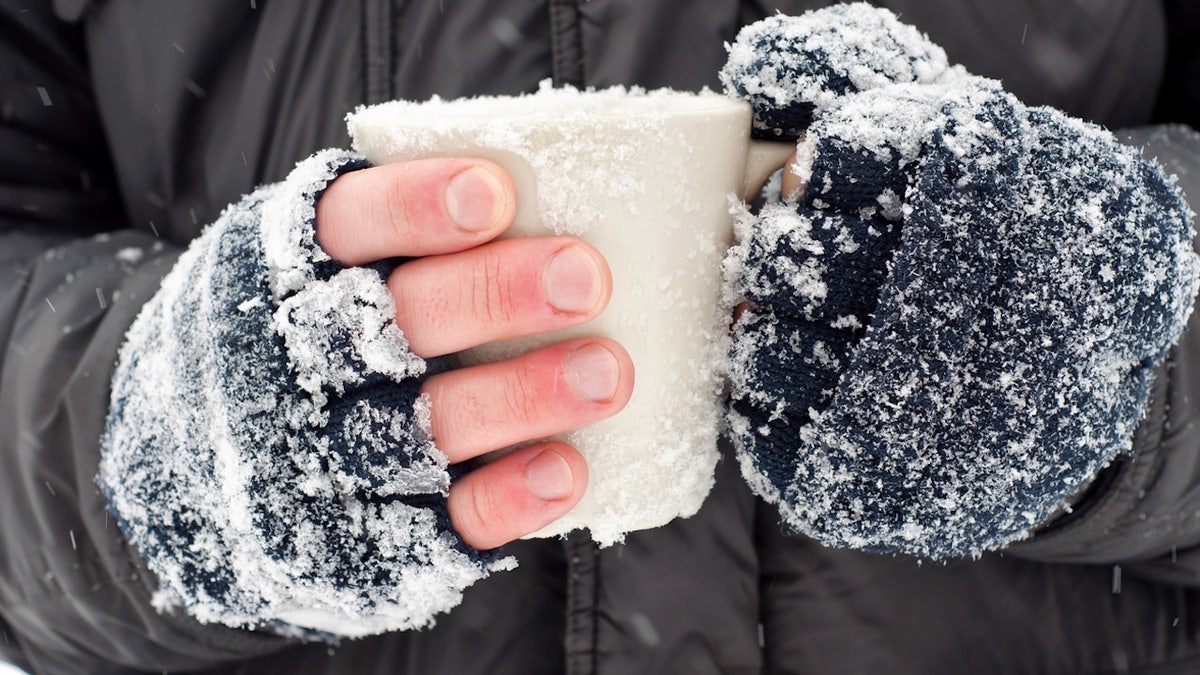 Cold hands on mug