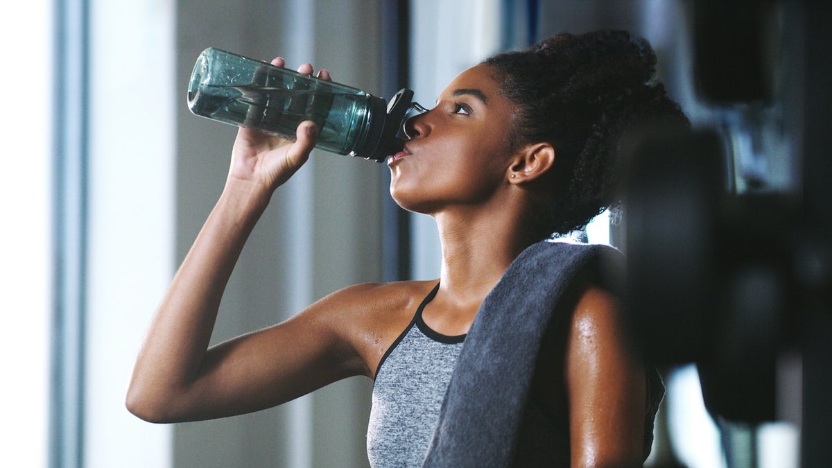 Woman drinking workout