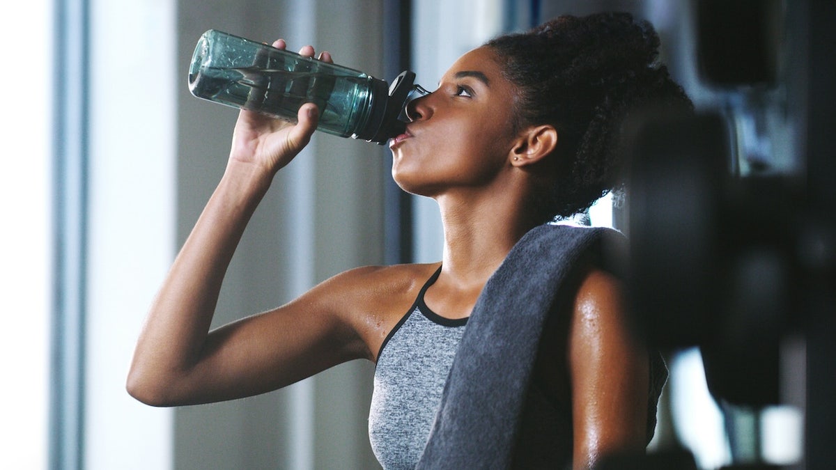 Woman drinking workout