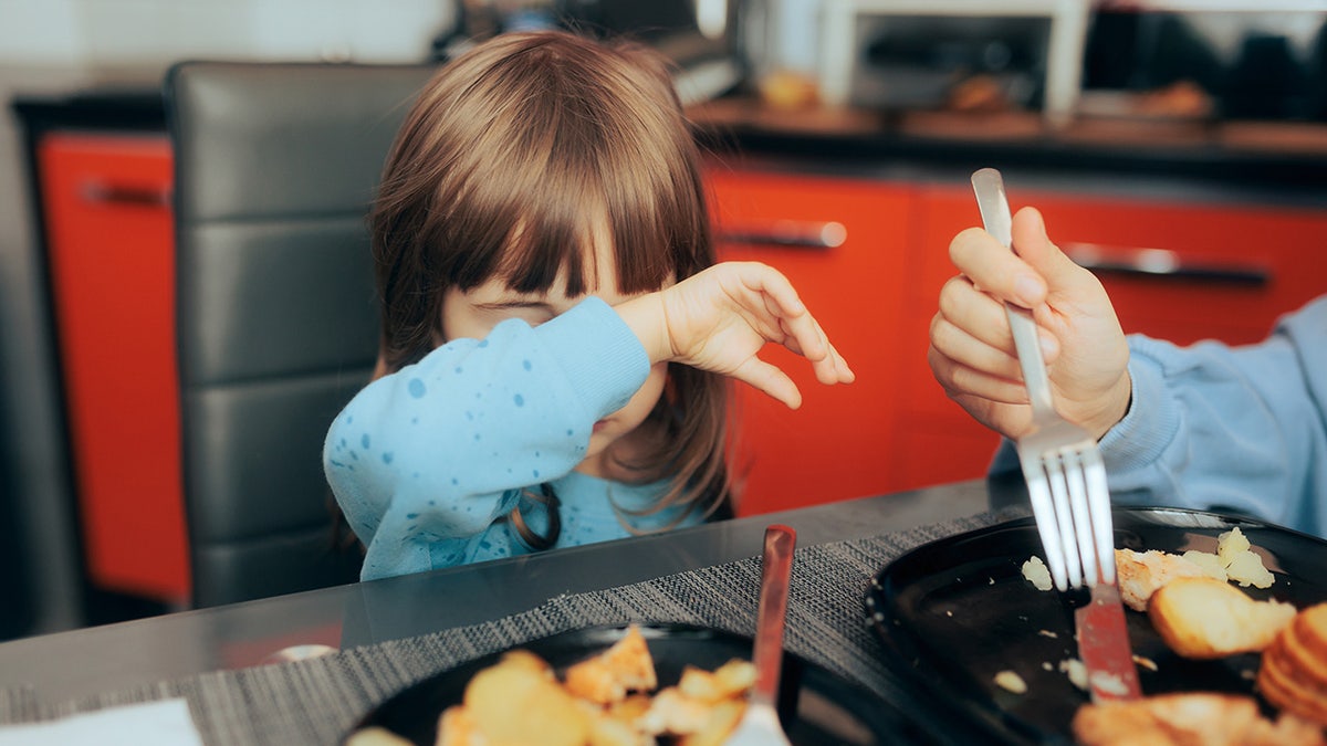 girl refusing food